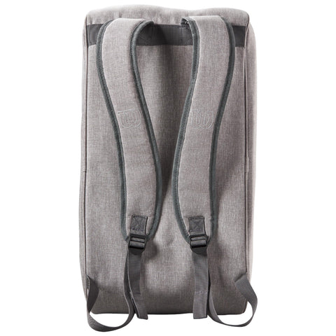 A gray backpack stands upright showcasing its padded straps designed for carrying. The material appears textured and is suitable for casual or sporting use, highlighting functionality and comfort.