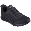 A black athletic shoe with a mesh upper and elastic laces is positioned prominently. It is designed for comfort and ease of wear in a casual or active setting.