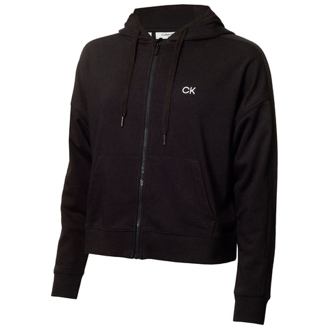 A black zip-up hoodie with a logo on the chest is displayed prominently. It features a hood and two front pockets, designed for casual wear in a relaxed setting.