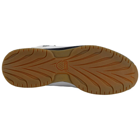 A sneaker sole is positioned flat, showcasing intricate tread patterns for grip. The surrounding context is a neutral background, emphasizing the design and material of the sole.