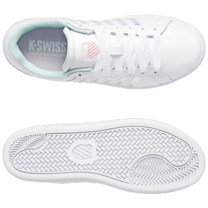 A white sneaker with a mint green lining features several iridescent stripes and is displayed from above next to its textured rubber sole in a clean setting. K-Swiss branding is visible inside.