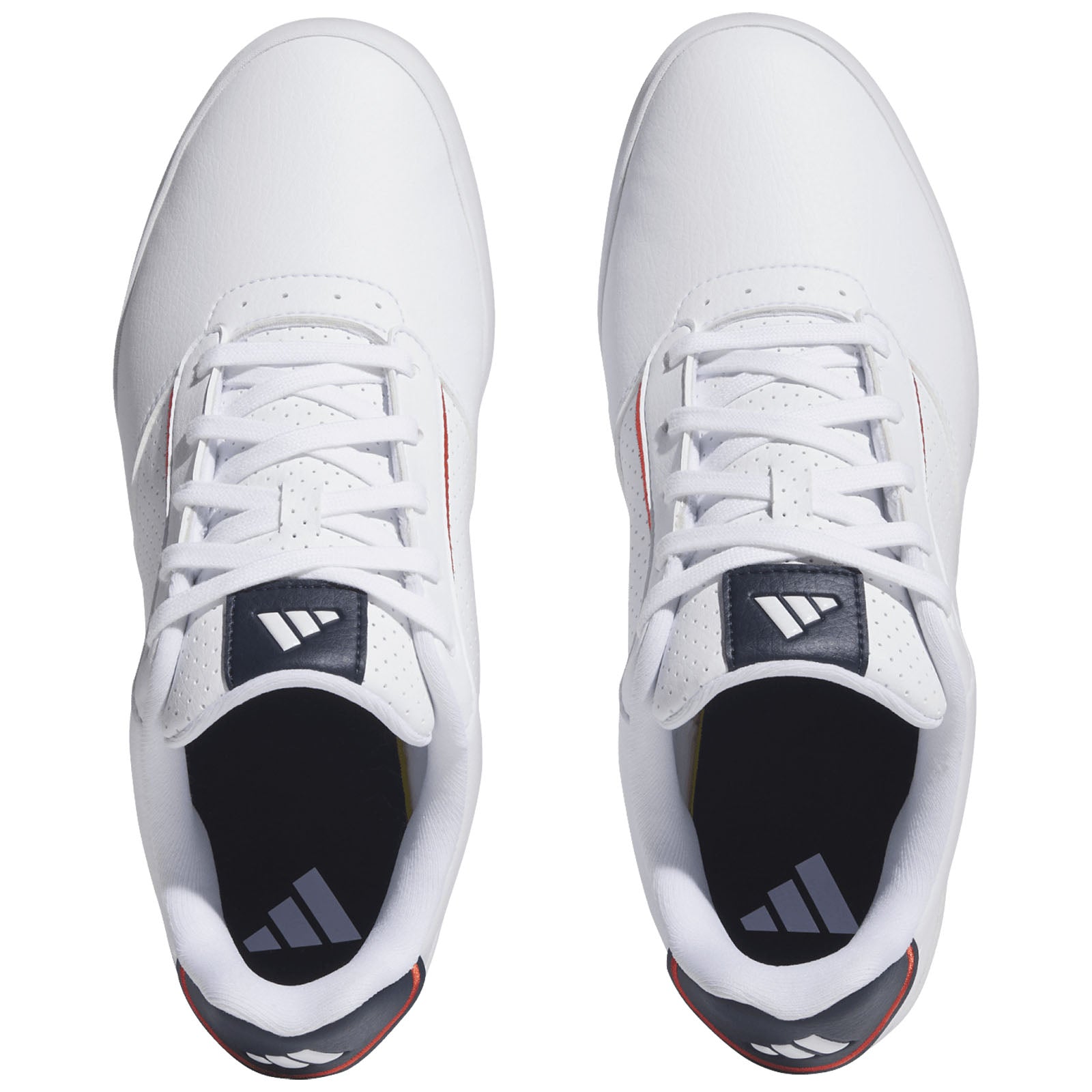 A pair of white athletic shoes with perforated sides laces and a navy accent on the tongue lies flat against a neutral background highlighting their sleek design and sporty appearance.