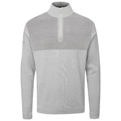 A gray zip-up pullover with a textured upper section and long sleeves is displayed on a white background showcasing a sporty design suitable for casual wear or athletic activities.