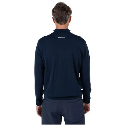 A man is wearing a dark navy sweater with a high collar and is shown from the back against a plain white background, highlighting the sweater's texture and branding.