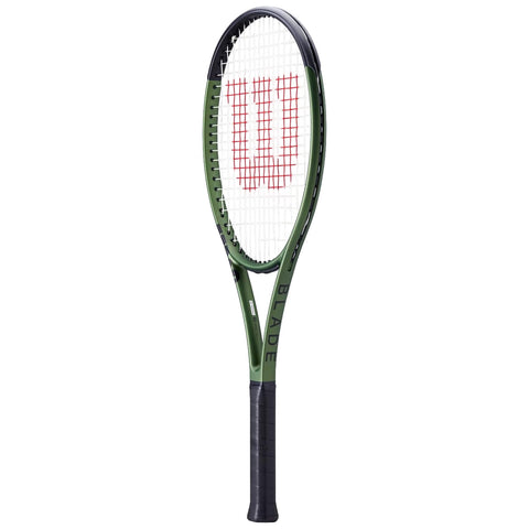 A tennis racket with a green frame and black handle is displayed upright with a white string pattern and a prominent red "W" logo in the center of the strings.