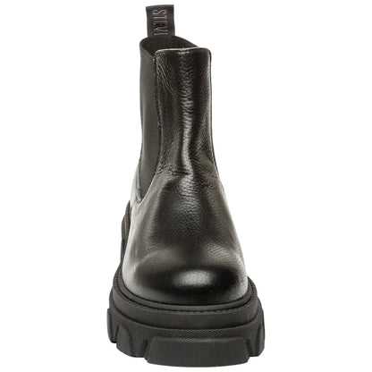 A pair of black leather ankle boots stands upright with a thick sole and a pull tab at the back showcasing a sleek design suitable for casual or semi-formal wear.