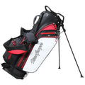 A black and red golf bag stands upright with extendable legs showcasing multiple zippered pockets and a branded logo while providing a convenient storage solution for golf clubs and accessories.