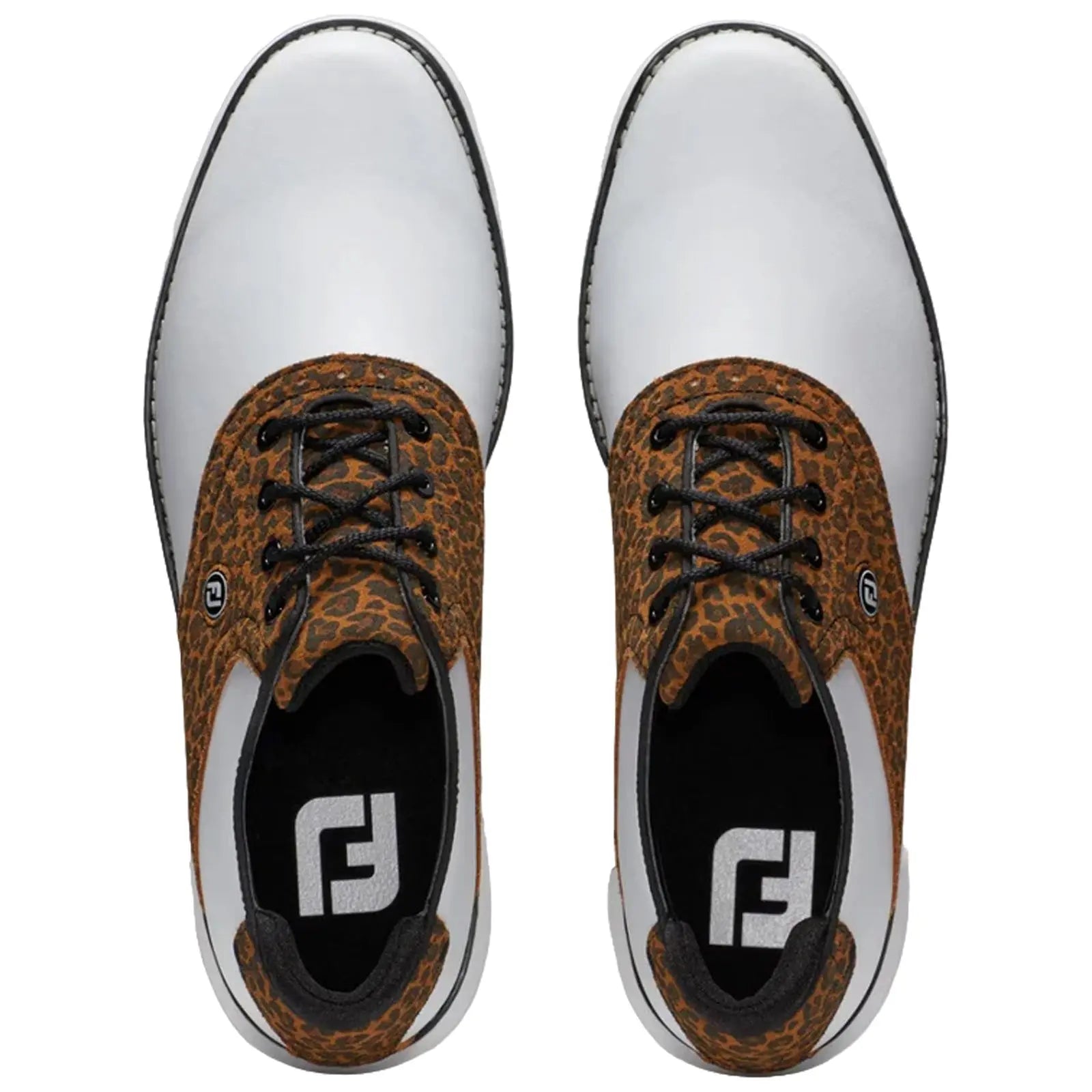 White and brown leopard print golf shoes are positioned with the laces tied and facing upward against a plain background showcasing a unique design blending solid and patterned materials.