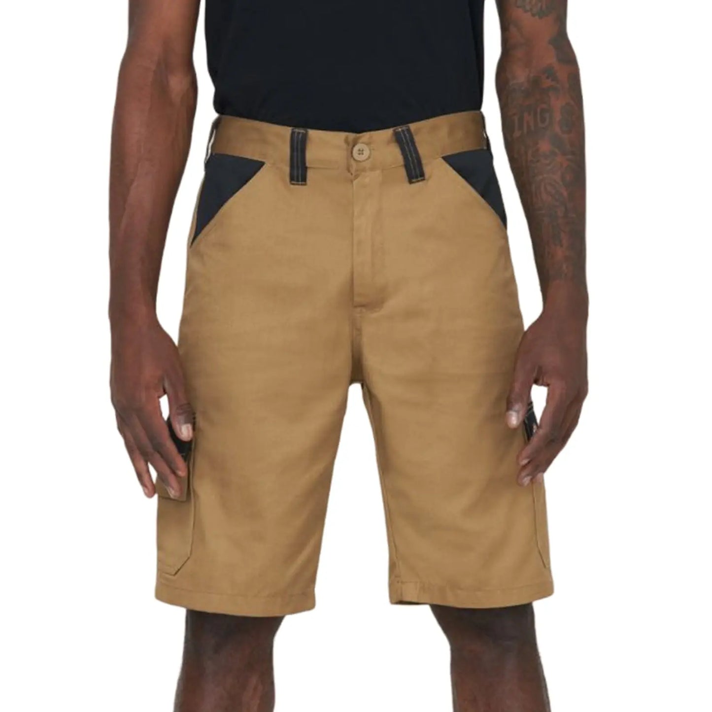Tan shorts are worn by a person standing upright with hands at their sides The shorts feature black accents near the pockets and are part of a casual outfit in a neutral setting