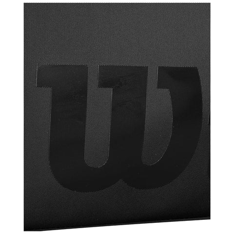 A black surface features a large stylized letter W prominently displayed in the center with a textured background enhancing its visibility