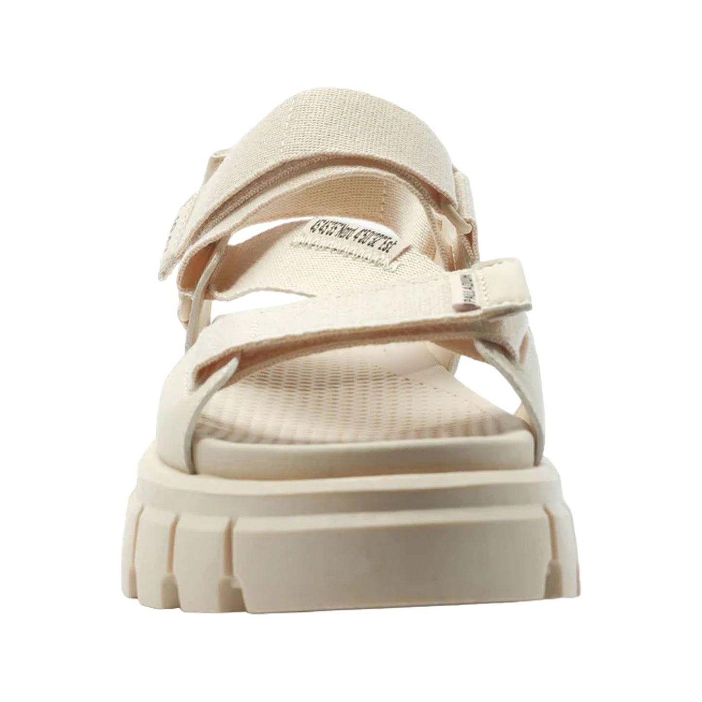 A light-colored sandal is positioned upright showcasing its adjustable straps and textured sole while emphasizing its lightweight design suitable for casual or outdoor wear.