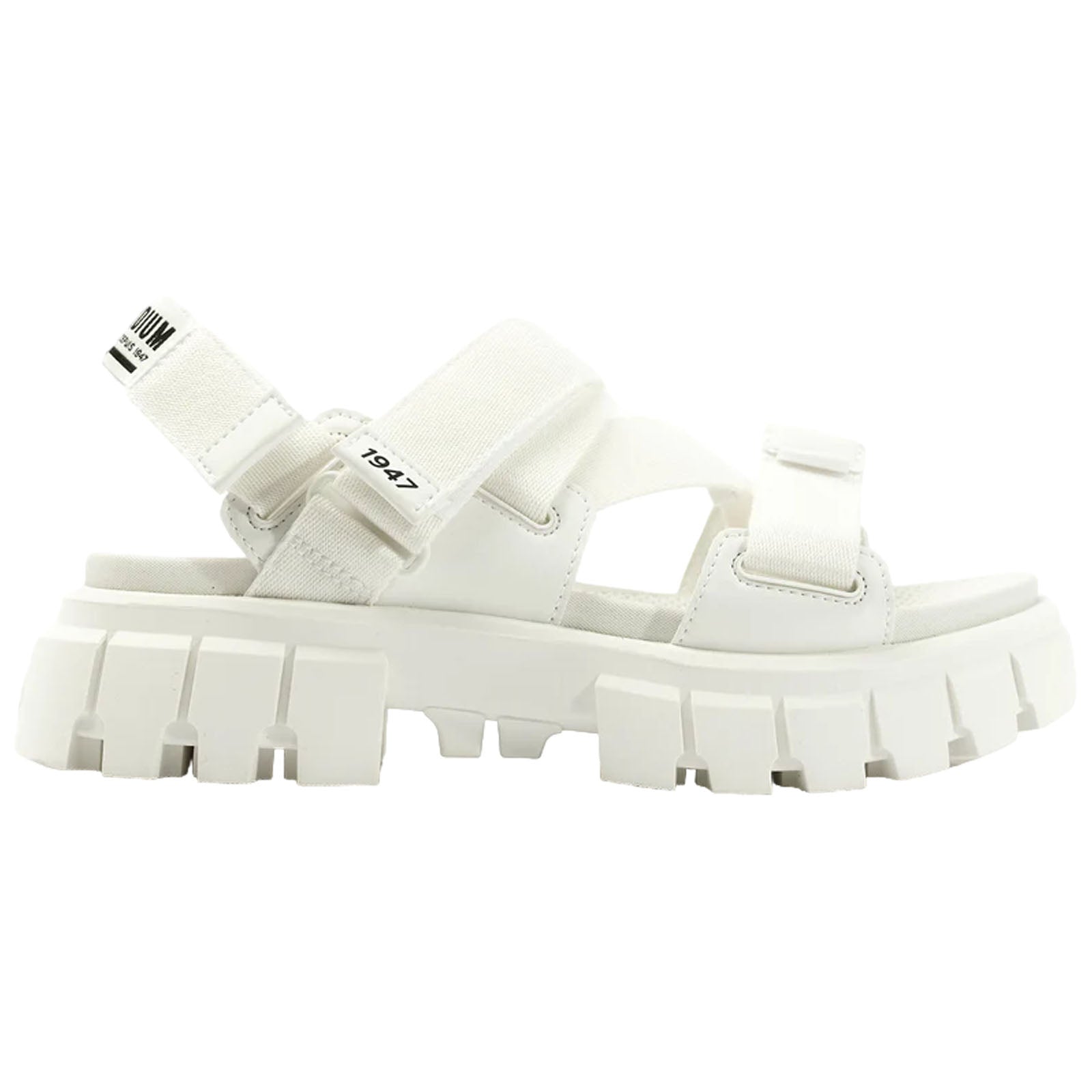 A white sporty sandal features thick soles with a rugged design and adjustable straps. It's displayed against a plain background emphasizing its minimalist style and modern aesthetic.