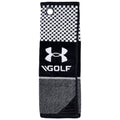 A black and white golf towel hangs vertically designed with a checkered pattern and Under Armour logo sporting the word GOLF providing a functional accessory for golfers in outdoor settings.