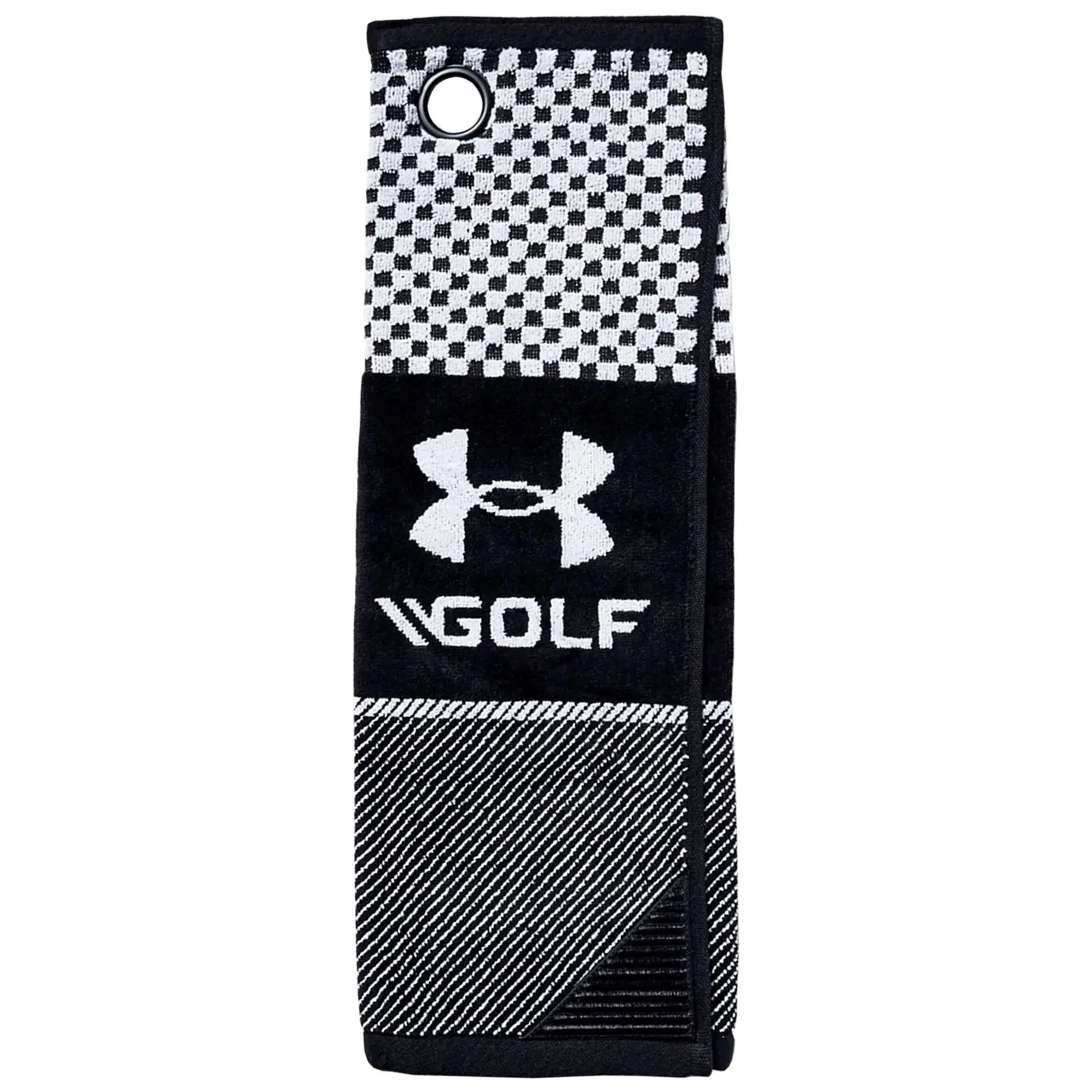 A black and white golf towel hangs vertically designed with a checkered pattern and Under Armour logo sporting the word GOLF providing a functional accessory for golfers in outdoor settings.