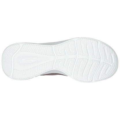 A white athletic shoe sole is displayed showing detailed tread patterns designed for grip and traction The shoe appears clean and well-defined against a plain background