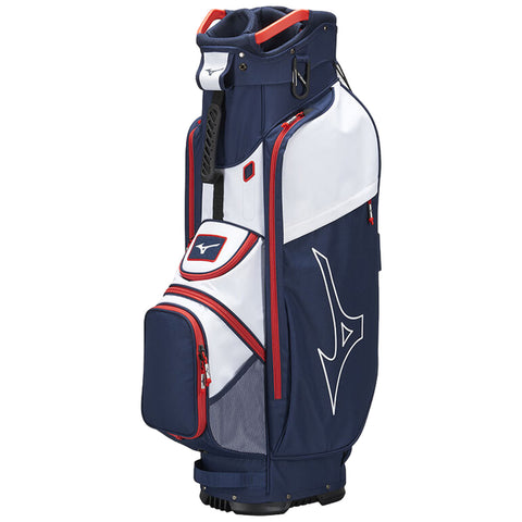 A golf bag stands upright featuring a navy blue fabric with white and red accents showcasing multiple compartments for storage and a logo prominently displayed on the front.