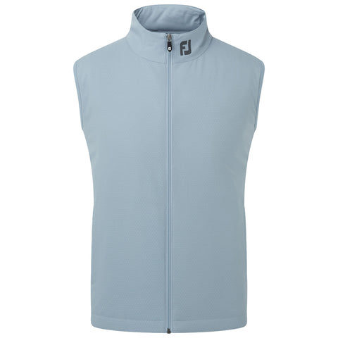 Light blue sleeveless vest hangs upright with a high collar and a front zipper showcasing a textured pattern designed for comfort and outdoor activity in cooler weather.