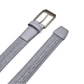 A grey woven belt with a shiny metal buckle lies flat on a white background showcasing its textured pattern and leather ends designed for fastening around the waist.