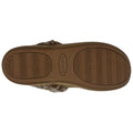 A brown shoe sole with a textured pattern lays flat showcasing the Skechers logo and rubber tread designed for grip in a neutral environment.