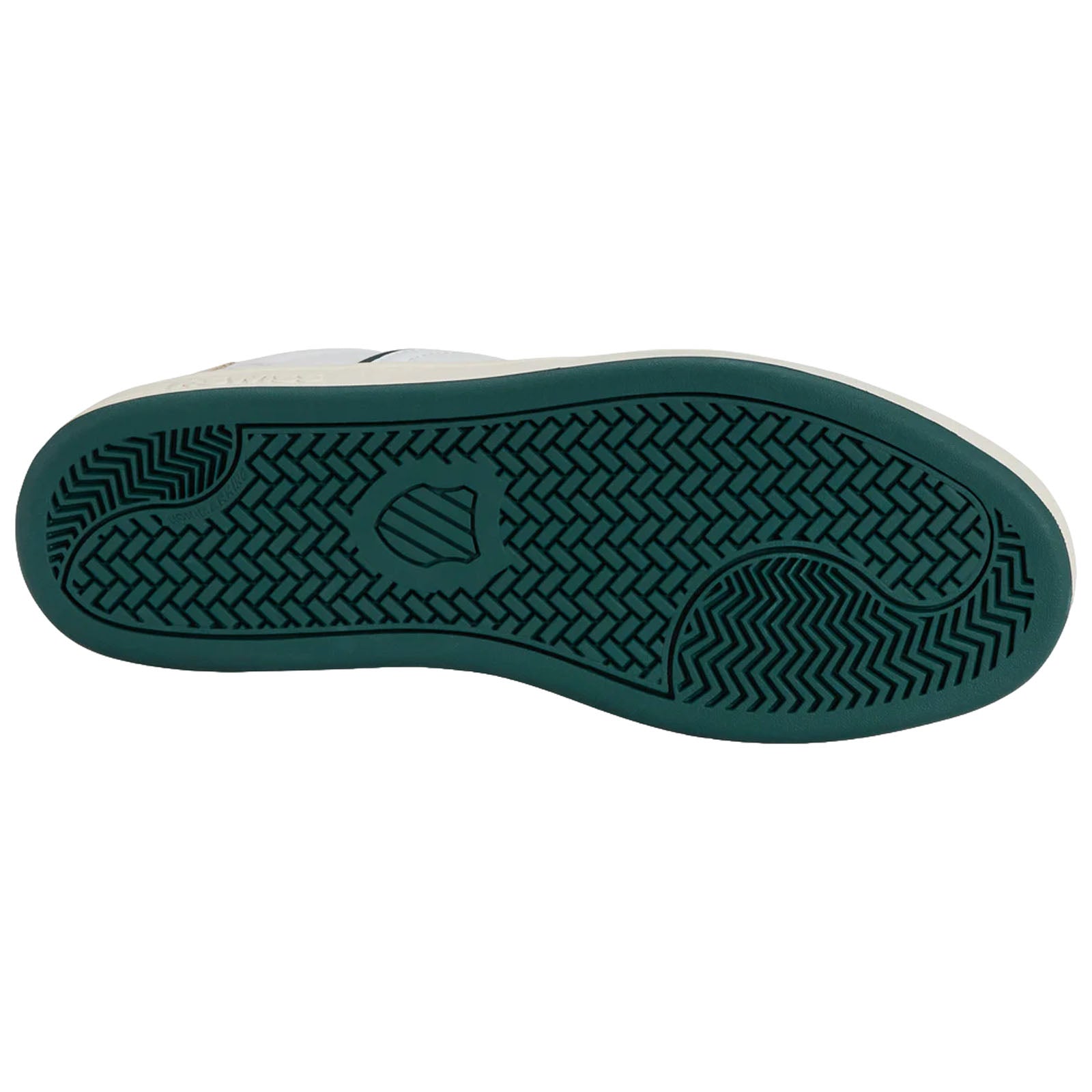 A green rubber shoe sole with a patterned tread is displayed flat against a neutral background showing texture and design for grip and durability.