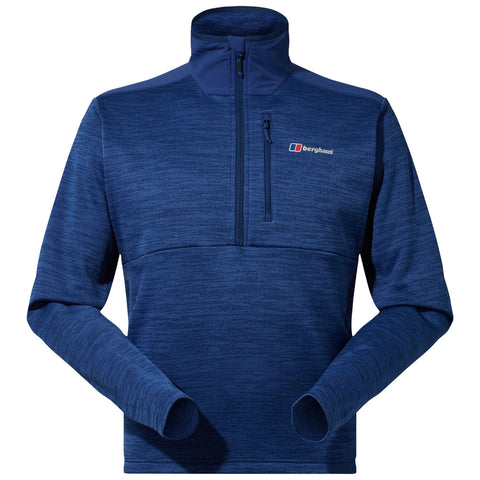 A blue fleece pullover is displayed with a high collar and a quarter zip at the front featuring a small chest pocket showing the berghaus logo.