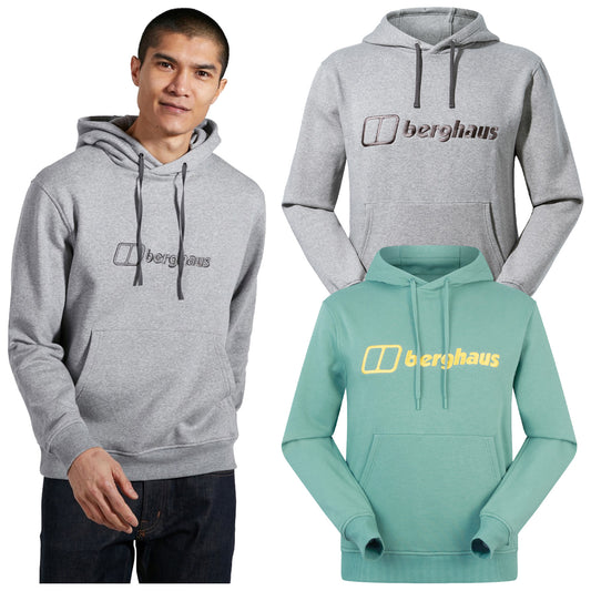 A man stands wearing a gray hooded sweatshirt with the logo "berghaus" displayed prominently. Behind him are additional sweatshirts in various colors: teal, gray, black, and navy.
