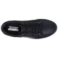 Black leather sneaker featuring laces and a padded collar resting flat. Inside the shoe, a label reads SKECHERS Air-Cooled MEMORY FOAM, indicating a focus on comfort and cushioning.