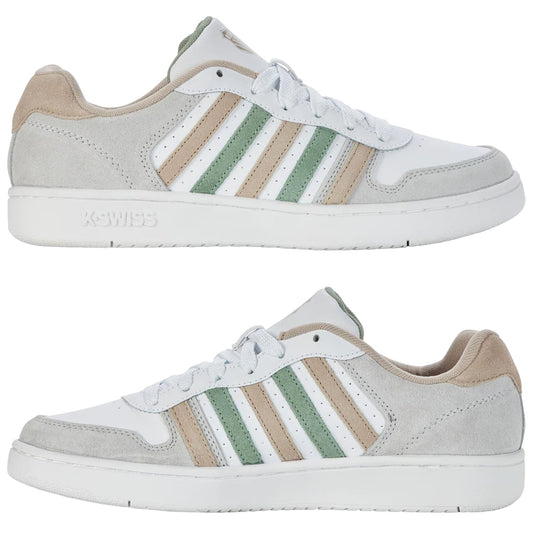 A pair of white sneakers with green and beige stripes rests on a flat surface showcasing smooth leather and suede textures designed for casual wear featuring a lace-up closure and a padded collar.