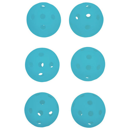 Six light blue balls are arranged in two rows of three displaying various holes across their surfaces indicating they are designed for sport or play in an indoor or outdoor setting