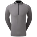 A gray long-sleeve shirt with a quarter zip is displayed. The shirt features a black collar with white stripes and a logo at the neckline.