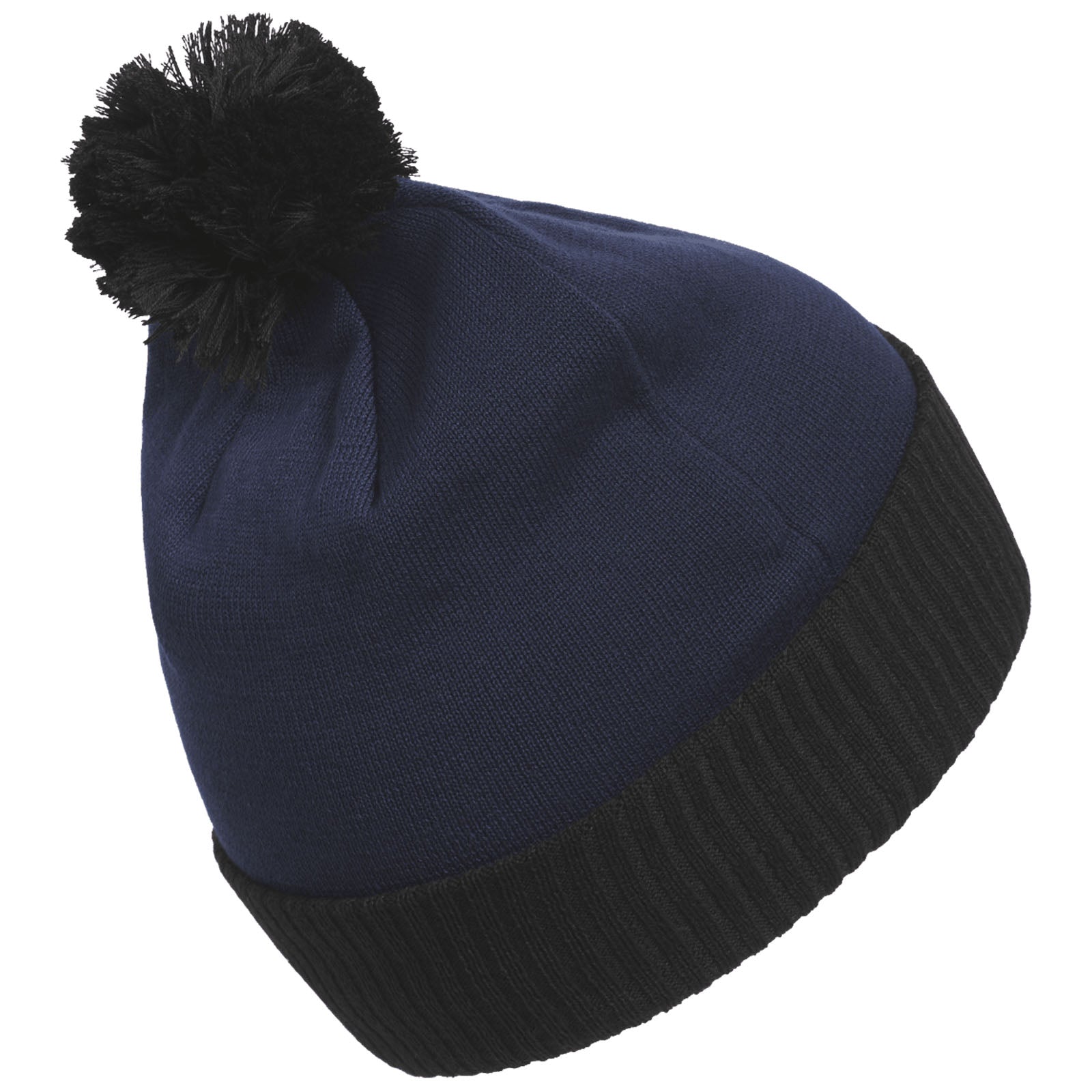 A navy blue knitted beanie with a black ribbed brim and a black pom-pom on top rests at an angle suggesting it is designed for warmth in cold weather conditions.
