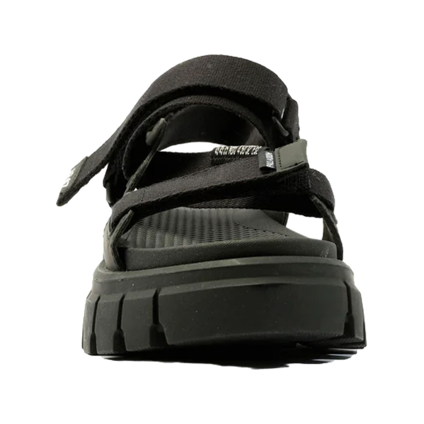 A black sandal features adjustable straps and a textured footbed while positioned upright against a plain background suggesting a casual footwear option for comfort and style.