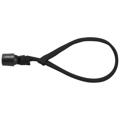 A black elastic loop with a plastic toggle knot is lying flat it is designed for securing or fastening objects in various contexts such as outdoor gear or equipment usage