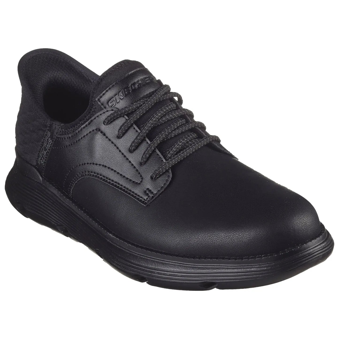 A black athletic shoe features a smooth leather upper with textured side panels and a thick rubber sole. It is designed for comfort and functionality in active environments.