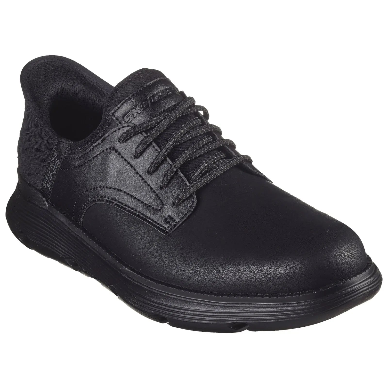 A black athletic shoe features a smooth leather upper with textured side panels and a thick rubber sole. It is designed for comfort and functionality in active environments.
