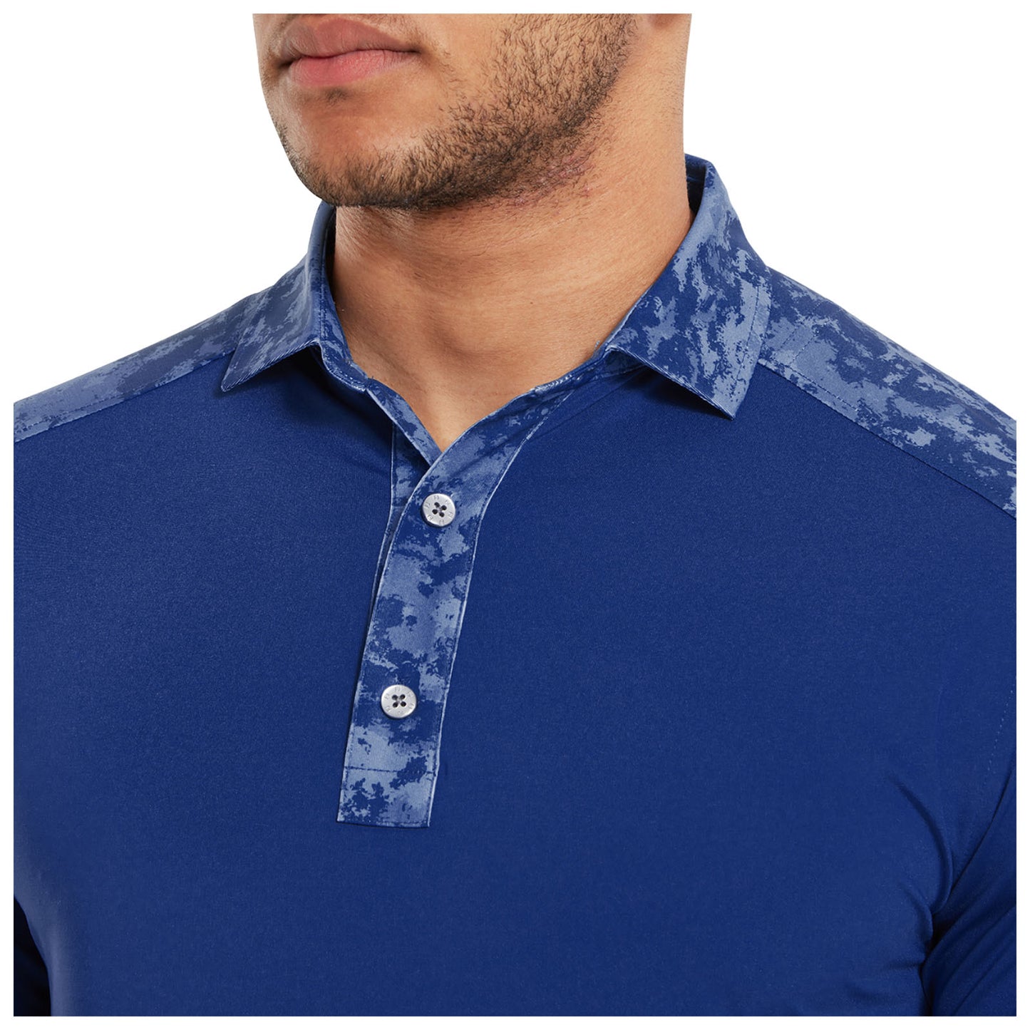 A blue polo shirt with a patterned collar features buttons at the neck with a close-up view of the neckline and collar providing a stylish and modern appearance.