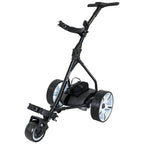 A black golf cart with three wheels is positioned upright in the center. It has a sturdy frame and a small storage compartment. The handle is designed for steering.