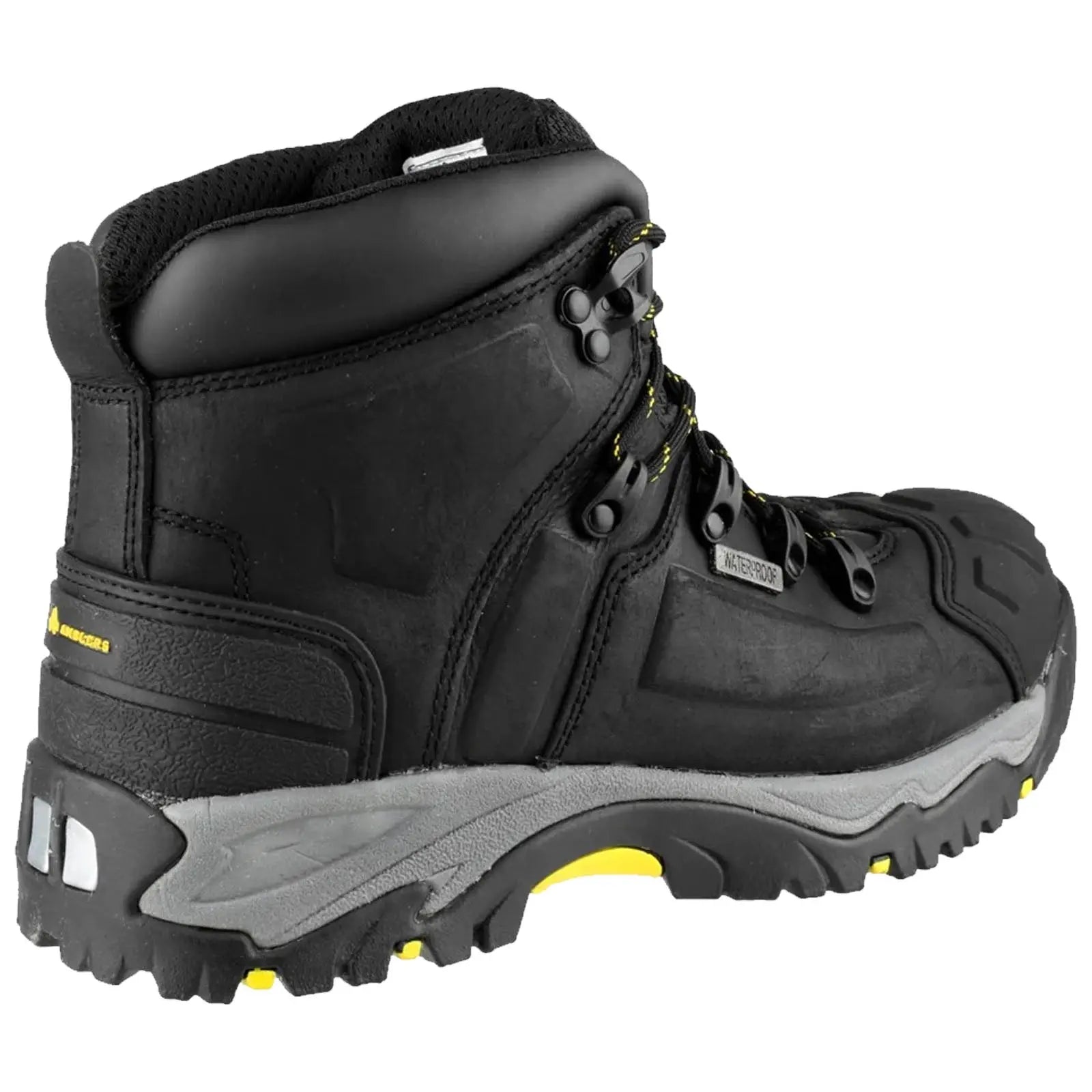 A black hiking boot features a rugged design with yellow accents and metal eyelets for laces positioned on a gray sole, designed for durability in outdoor settings.