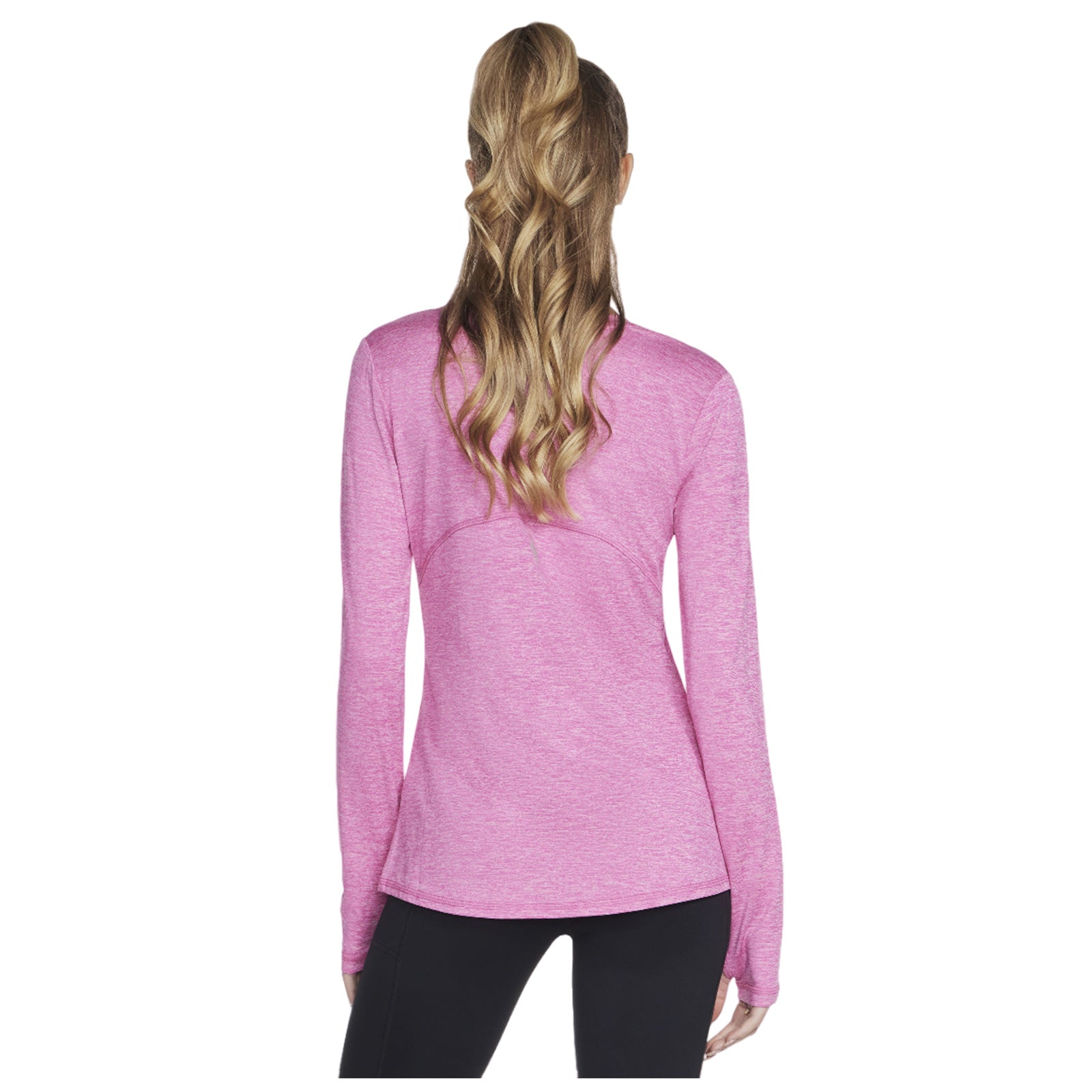 A person is wearing a long-sleeved pink athletic top designed for comfort while engaging in sports or exercise the setting suggests an active lifestyle or workout environment.