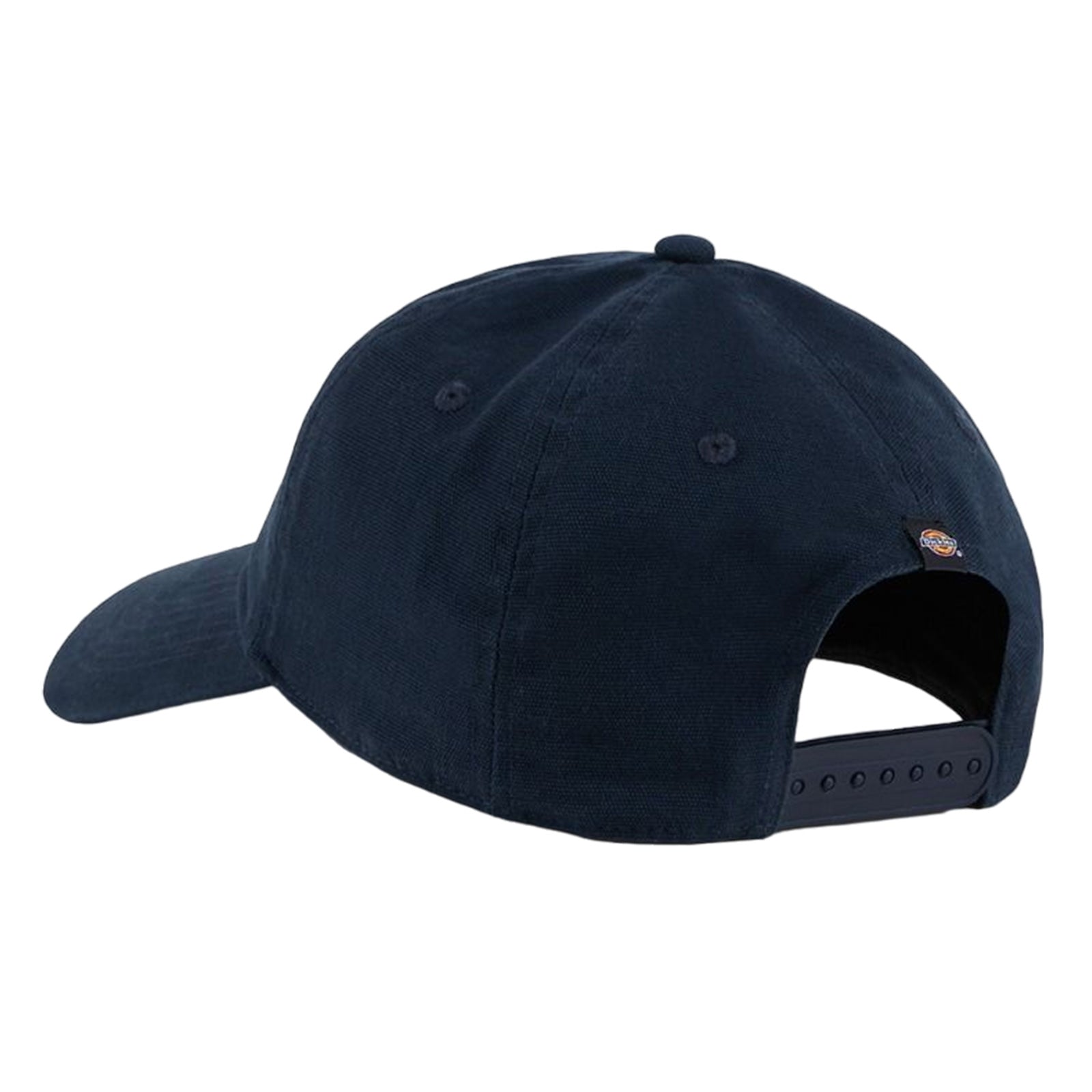 A navy baseball cap rests on a flat surface displaying its curved brim and adjustable strap at the back surrounded by a plain background.