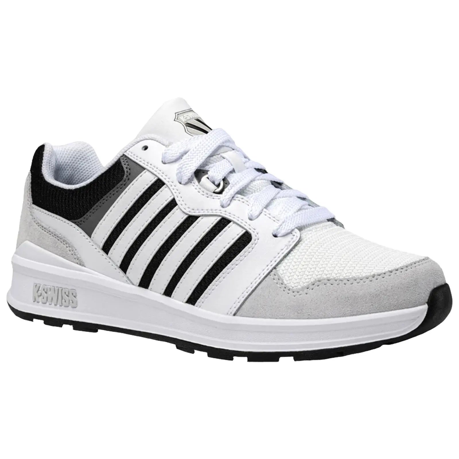 A sneaker is positioned on a flat surface showcasing a predominantly white design with black and gray accents featuring a textured upper mesh and a rubber outsole with patterned tread.