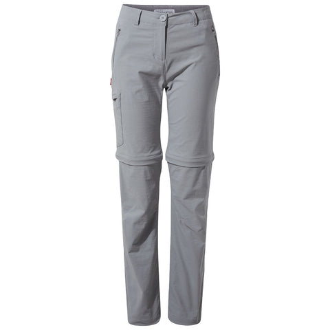 Light gray outdoor pants stand upright showcasing their tapered legs and zippers on the front pockets. They feature adjustable cuffs suitable for various activities in outdoor environments.