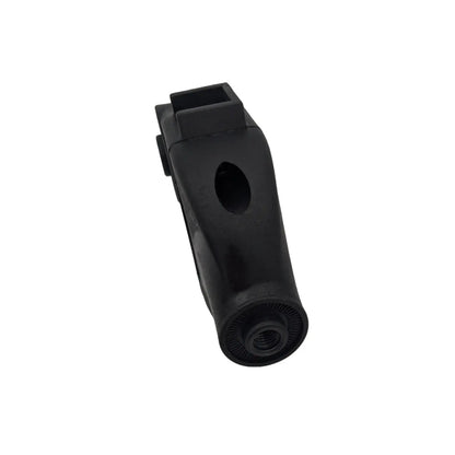 A black whistle rests on a white background, designed for sound production when blown, commonly used in sports or signaling, with a textured mouthpiece for grip and airflow.