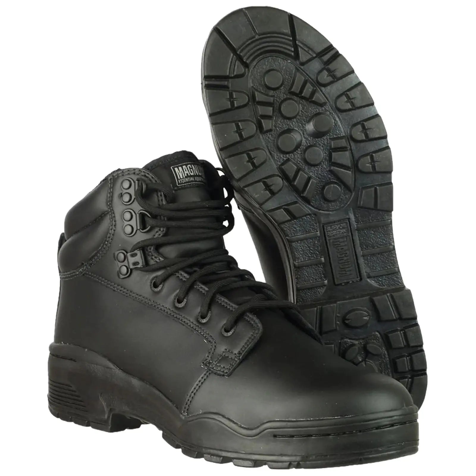 Black combat boots are positioned upright with laces tightened while the soles display a rugged tread pattern set against a plain white background emphasizing their sturdy construction and practical design.