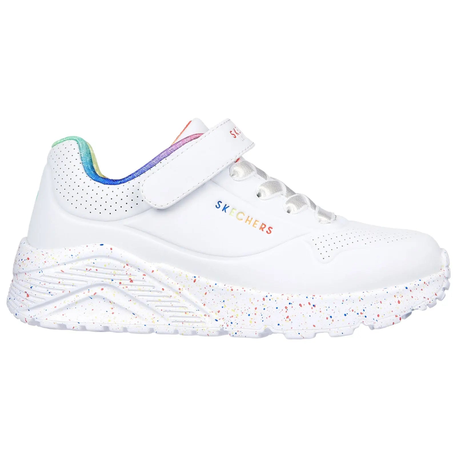 White athletic shoe with a speckled sole features a velcro strap and laces showcasing colorful elements on the heel in a simple and modern design suitable for casual wear.