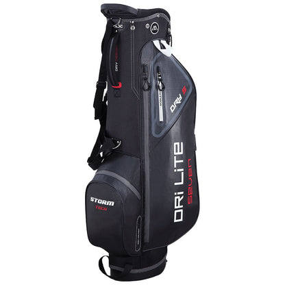 A black and gray golf bag stands upright featuring multiple compartments and a sleek design showcasing the text DRI LITE and STORM TECH organized for carrying golf clubs in various outdoor settings.