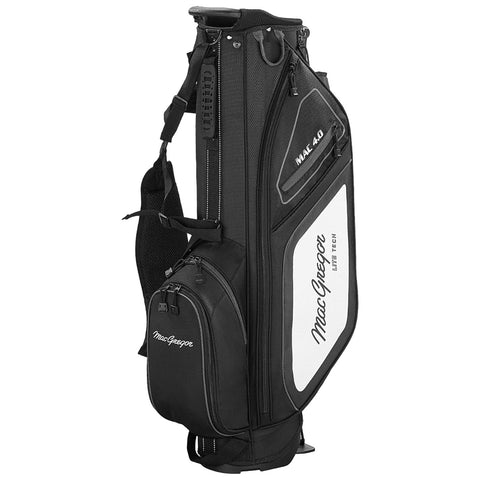 A black and white golf bag stands upright showcasing multiple compartments for clubs and accessories featuring the brand name MacGregor prominently displayed on the side.