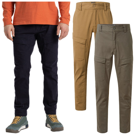 Three pairs of cargo pants in different colors are displayed with a person wearing dark navy pants. The person has their hands at their sides and is in a casual setting.