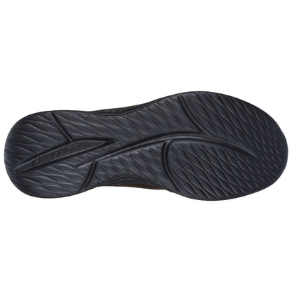 A black rubber shoe sole is displayed flat showing detailed tread patterns and the brand name Skechers embossed on the surface highlighting its design for traction and support.
