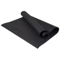 A black exercise mat is partially rolled up displaying a textured surface and the word "PURE" embossed on it resting on a flat surface ideal for workouts or yoga practice.